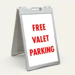 Free Valet Parking sign bold red text on white background