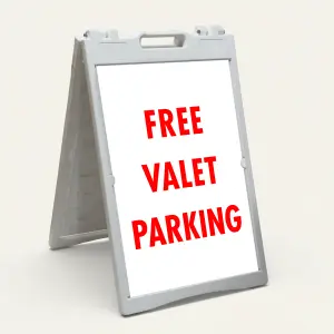 Free Valet Parking sign bold red text on white background