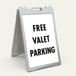 Free Valet Parking sign black text on white background