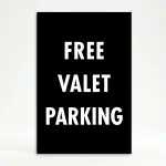 Free Valet Parking sign white text on black background high contrast