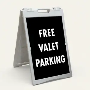 Free Valet Parking sign white text on black background high contrast