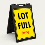 Lot Full Sorry parking sign with yellow background and bold text