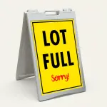 Lot Full Sorry parking sign with yellow background and bold text