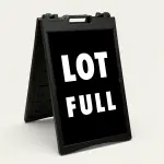 Lot Full sign black background white text