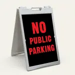 No Public Parking sign red text on black background