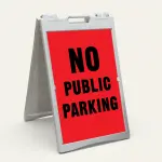No Public Parking sign black text on red background