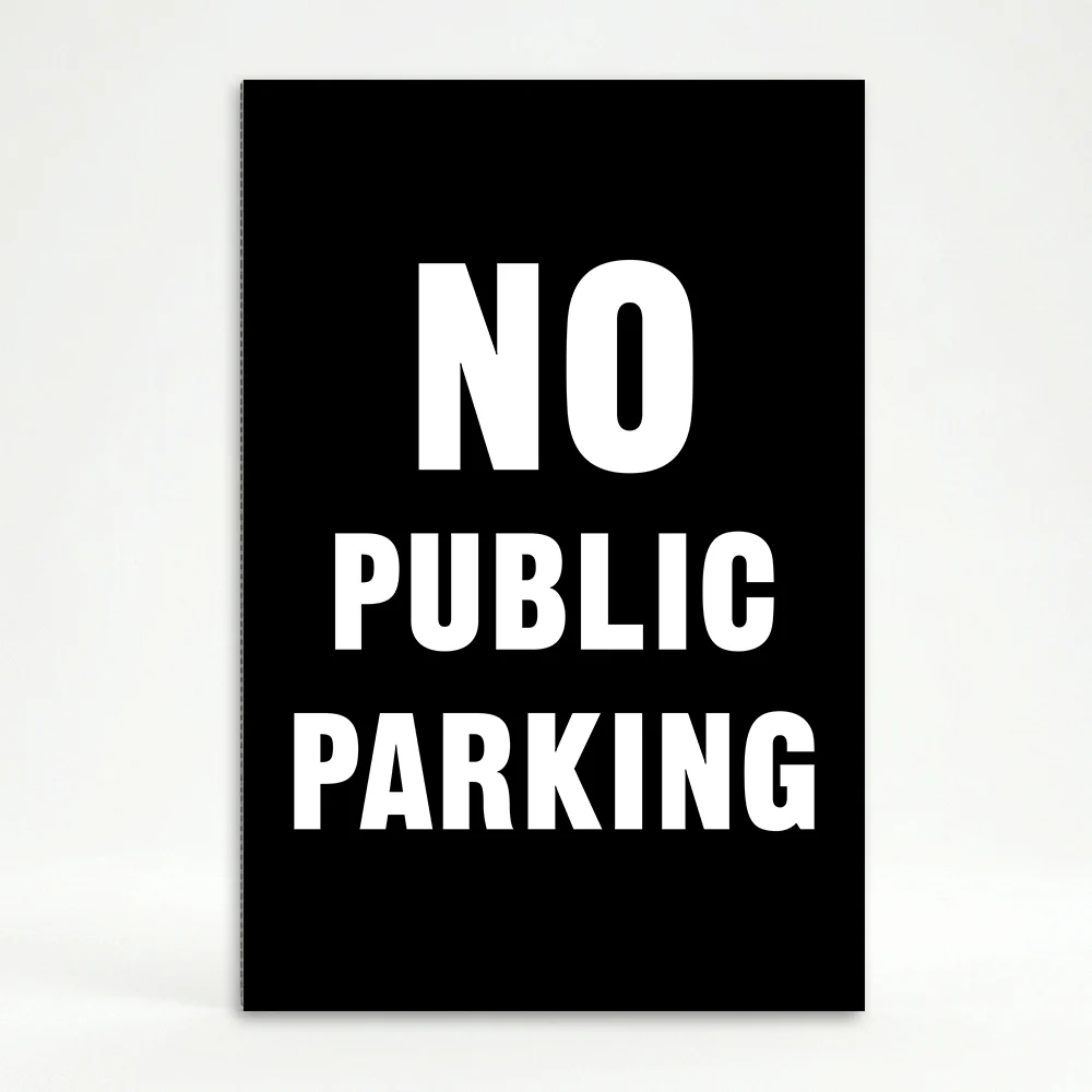 No Public Parking sign white text on black background