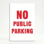 No Public Parking sign black text on yellow background