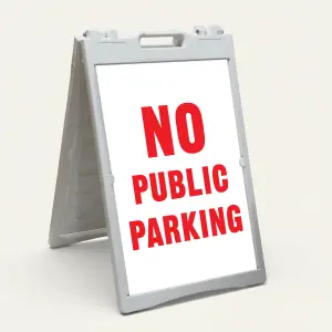No Public Parking sign black text on yellow background