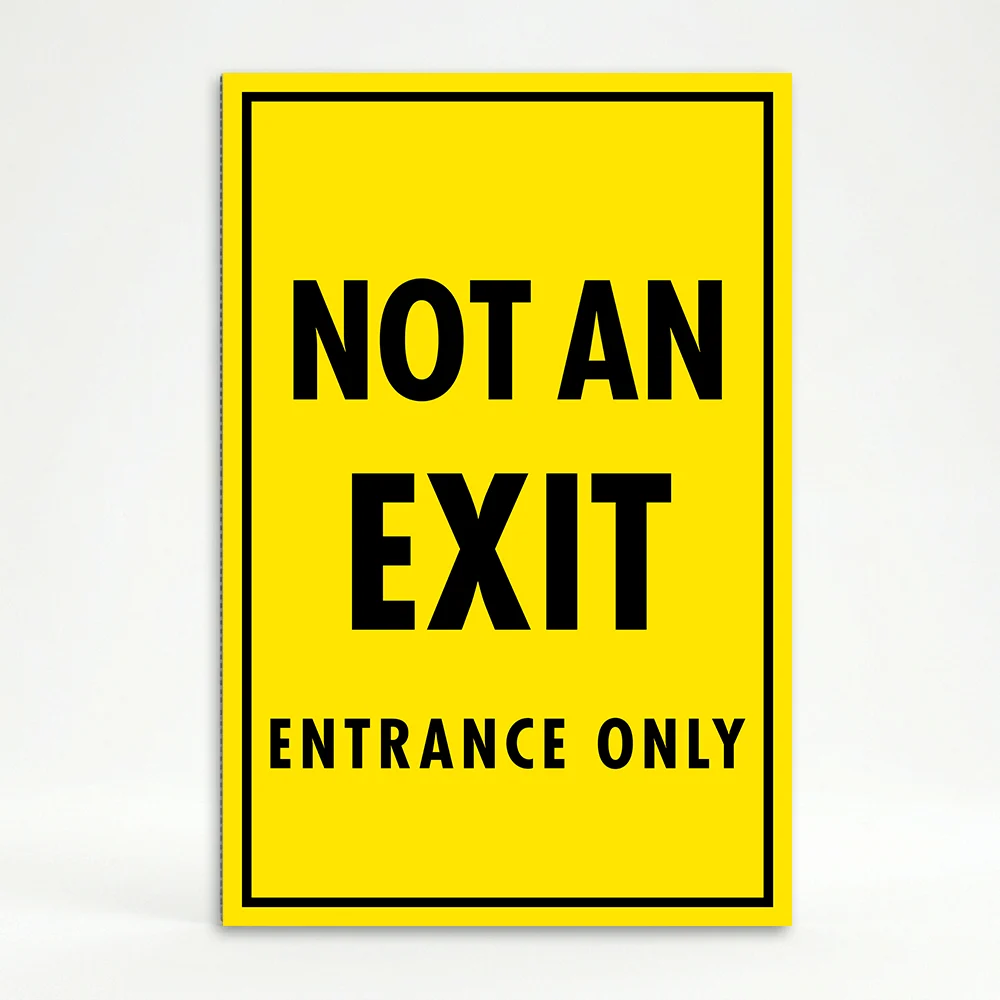 Not an Exit Entrance Only sign with yellow background and black text