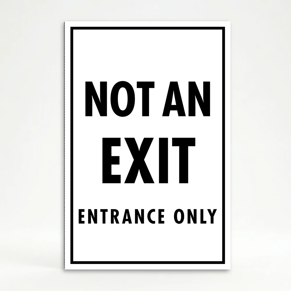 Not an Exit Entrance Only sign with white background and black text