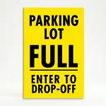 Parking Lot Full Enter to Drop-Off sign with black text on yellow background