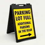 Parking Lot Full Additional Parking in the Rear sign with right arrow on yellow background