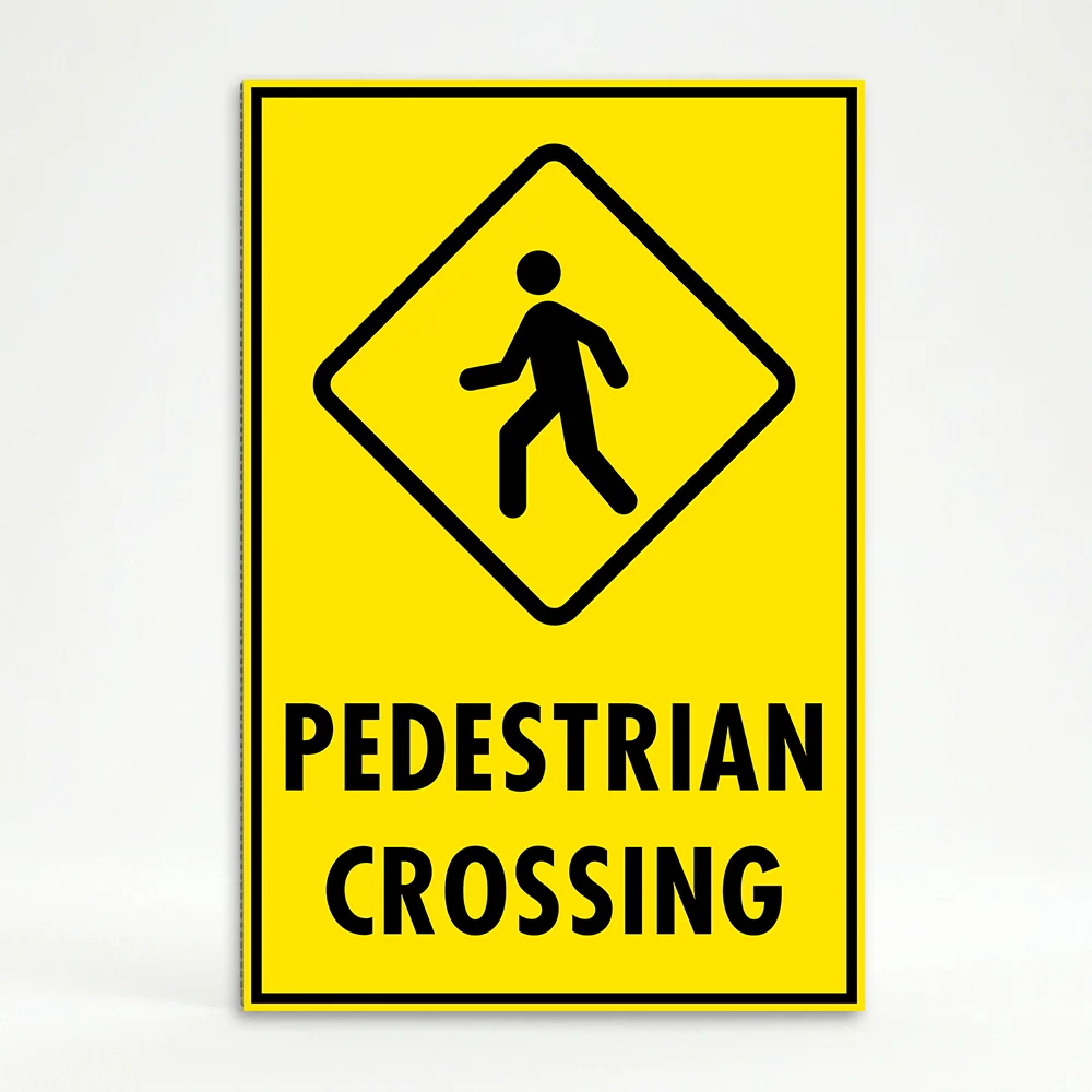 Pedestrian Crossing sign with diamond symbol and bold black text on yellow background