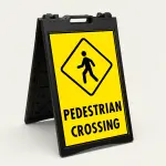 Pedestrian Crossing sign with diamond symbol and bold black text on yellow background