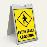 Pedestrian Crossing sign with diamond symbol and bold black text on yellow background