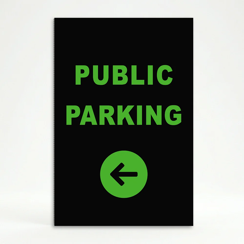 Public Parking sign with green text and left-pointing arrow on black background