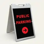 Public Parking sign with red text and right-pointing arrow on black background