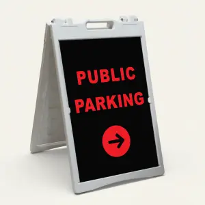 Public Parking sign with red text and right-pointing arrow on black background