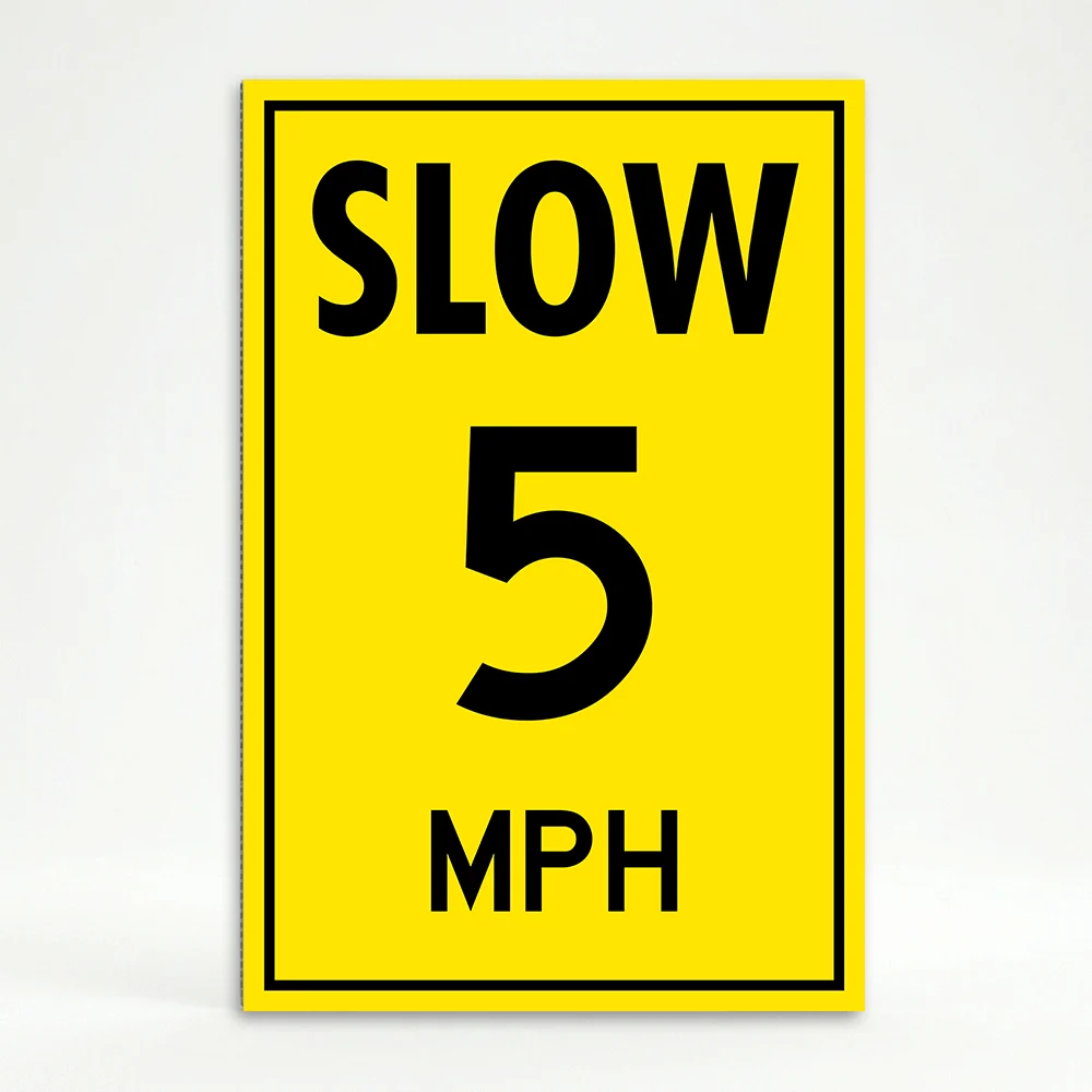Slow 5 MPH speed limit sign with bold black text on yellow background
