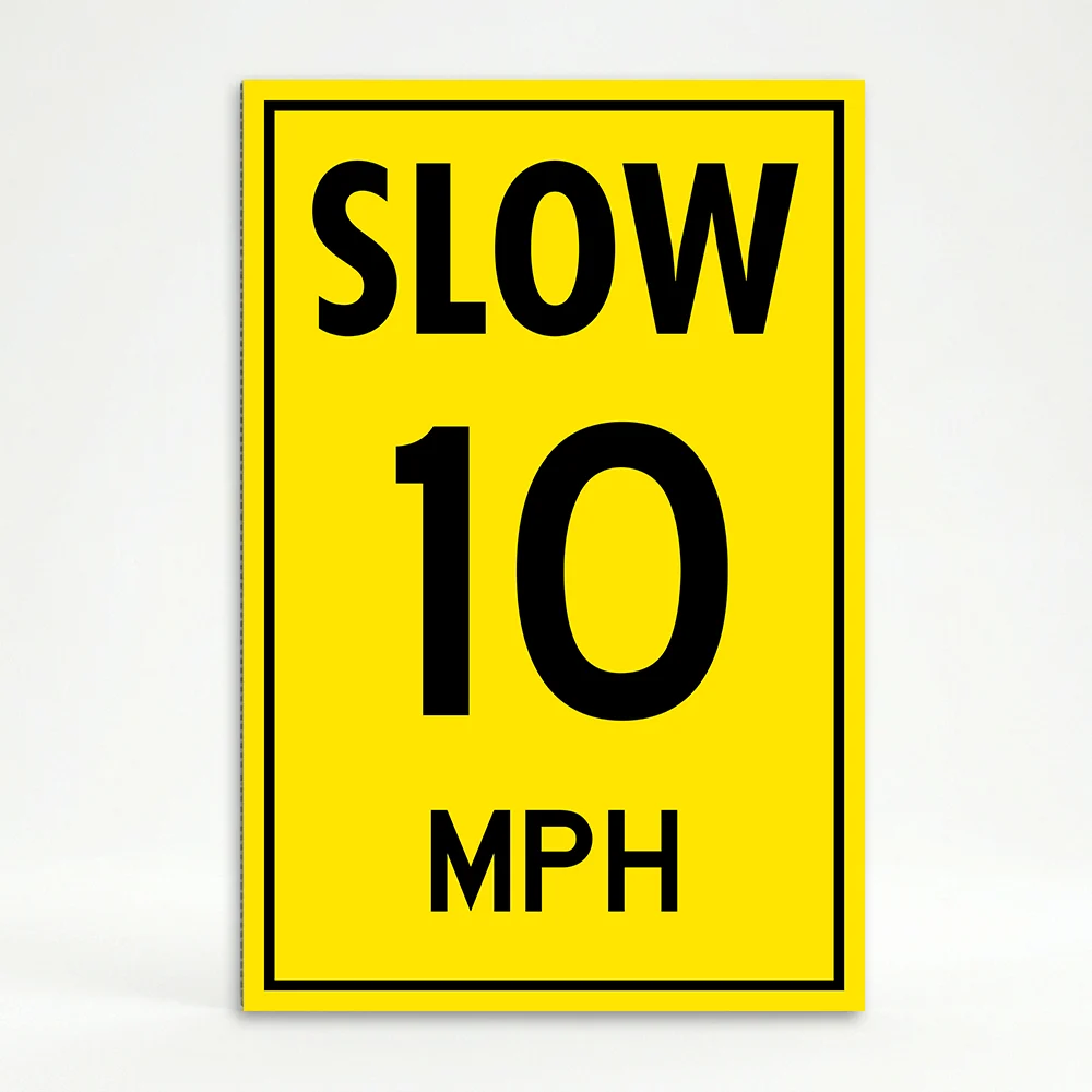 Slow 10 MPH speed limit sign with bold black text on yellow background