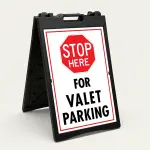 Stop Here for Valet Parking sign with red STOP HERE symbol and black text on white background