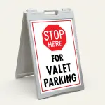 Stop Here for Valet Parking sign with red STOP HERE symbol and black text on white background