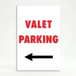 Valet Parking sign with bold red text and left-pointing black arrow on white background