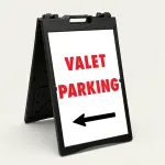 Valet Parking sign with bold red text and left-pointing black arrow on white background