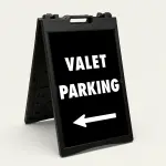 Valet Parking sign with bold white text and left-pointing arrow on black background