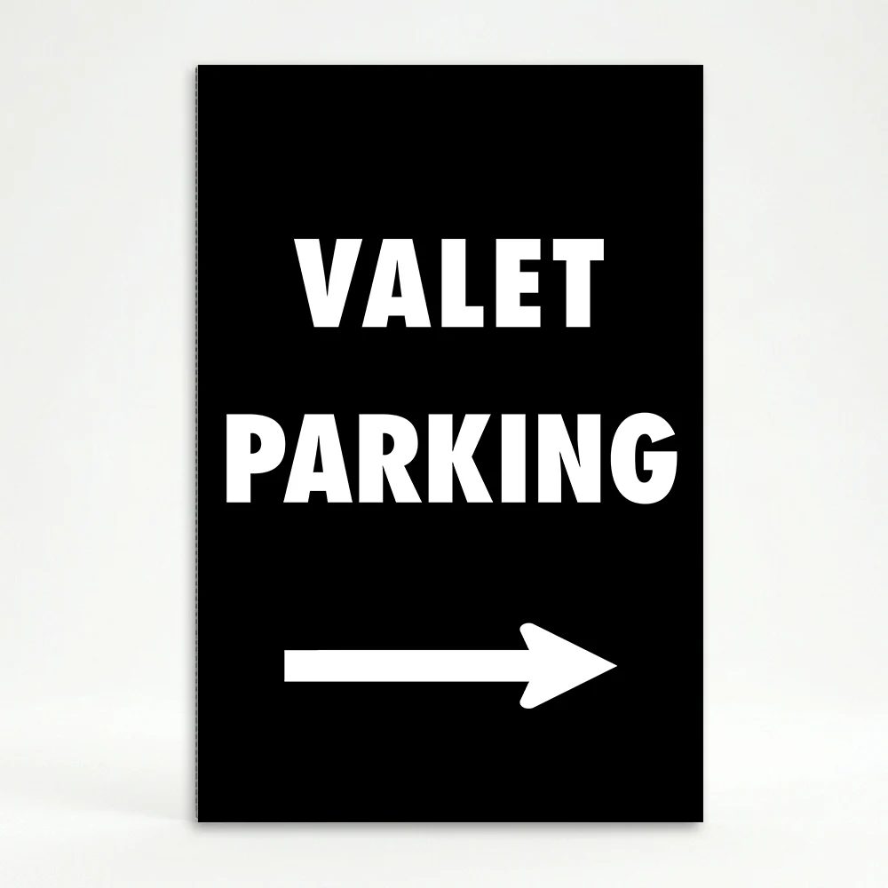 Valet Parking sign with bold white text and right-pointing arrow on black background