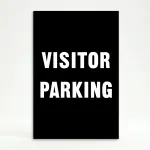 Visitor Parking sign with bold white text on black background