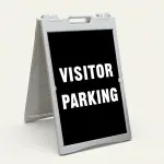 Visitor Parking sign with bold white text on black background