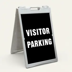 Visitor Parking sign with bold white text on black background