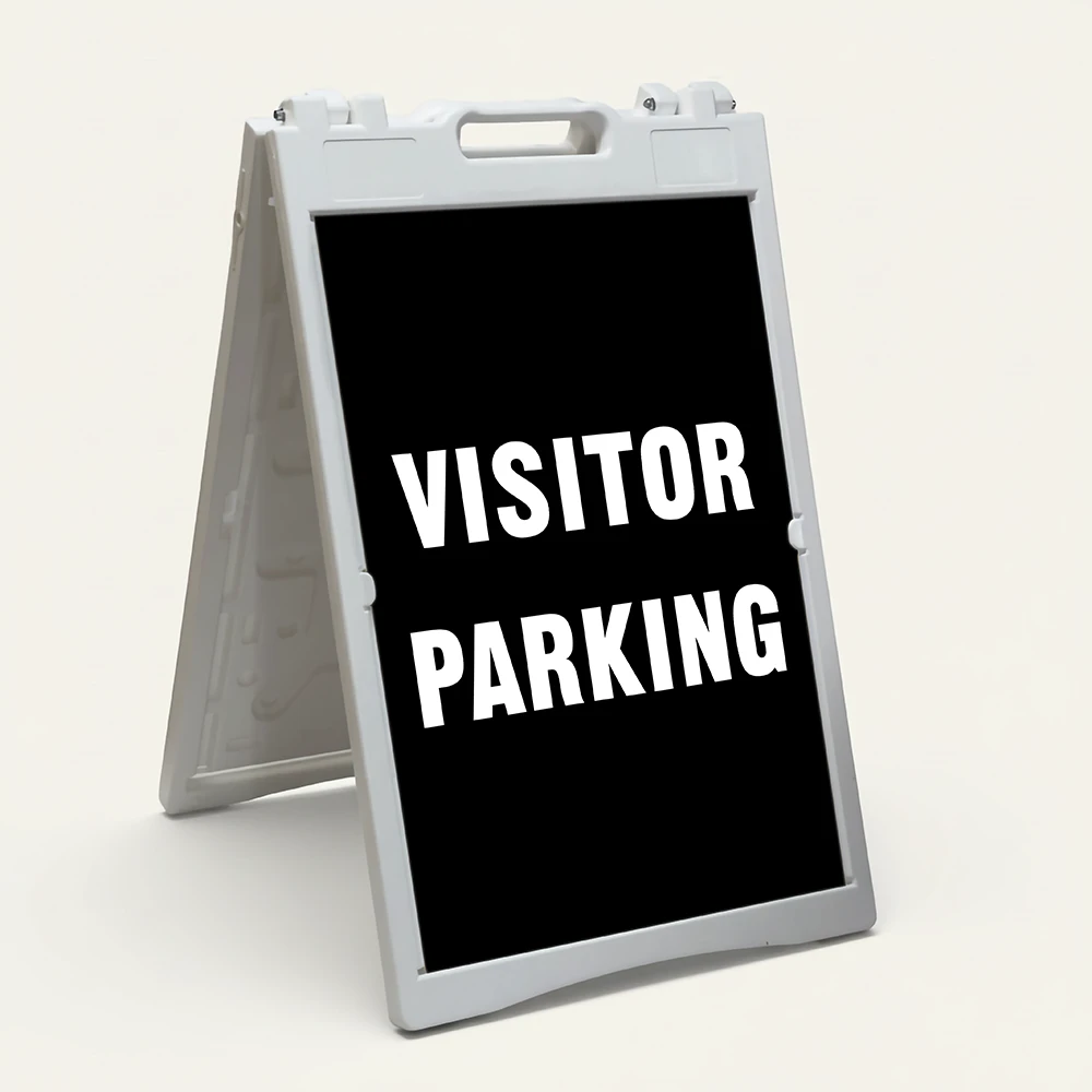 Visitor Parking sign with bold white text on black background