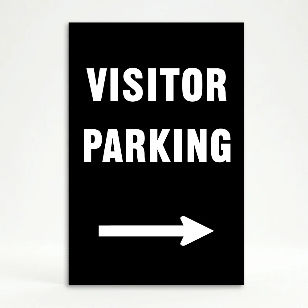 Visitor Parking sign with bold white text and right-pointing arrow on black background