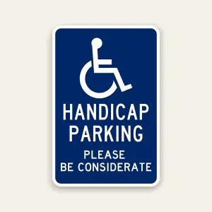 Handicap parking please be considerate sign with ADA symbol