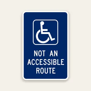 Not an accessible route sign with ADA symbol indicating non-compliant path