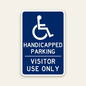 Handicapped parking visitor use only sign with ADA symbol for controlled visitor parking