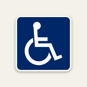 Handicap parking symbol sign with ADA icon marking accessible parking space