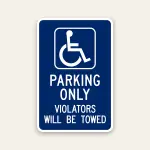 Handicap parking only tow away sign with ADA symbol and violators will be towed message
