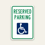 Reserved handicap parking sign with ADA symbol marking designated accessible space
