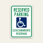 Reserved handicap parking bilingual sign with ADA symbol and Spanish English text