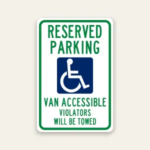 Reserved handicap parking van accessible tow away sign with ADA symbol