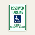 Reserved handicap parking during business hours sign with ADA symbol
