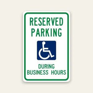 Reserved handicap parking during business hours sign with ADA symbol