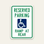 Reserved handicap parking ramp at rear sign with ADA symbol
