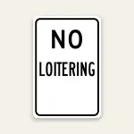 No Loitering sign bold black text on white Maxmetal panel Los Angeles