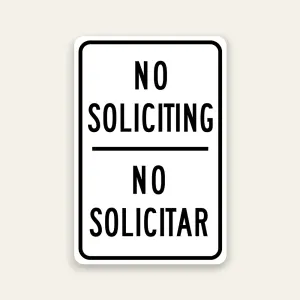 Bilingual No Soliciting No Solicitar sign bold black text on white Maxmetal panel Los Angeles
