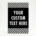Custom text hazard stripe A-frame sign with black panel and white diagonal stripes in white frame for Los Angeles business or property